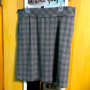 Black and grey plaid skirt. New with tags size large